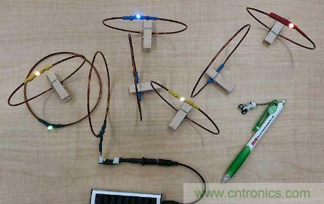 用來驗證&ldquo;直流共振方式&rdquo;的試制系統。在線圈間傳輸電力，點亮LED