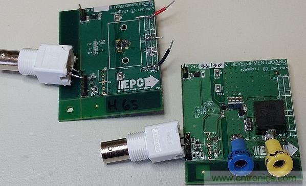 圖1：這里僅在左側(cè)的電路板上配備了半橋配置，右側(cè)的電路板配備了完整的DC-DC轉(zhuǎn)換器。香蕉插座可將測試板連接至電子負載。通過BNC連接器可連接至外部脈沖發(fā)生器。